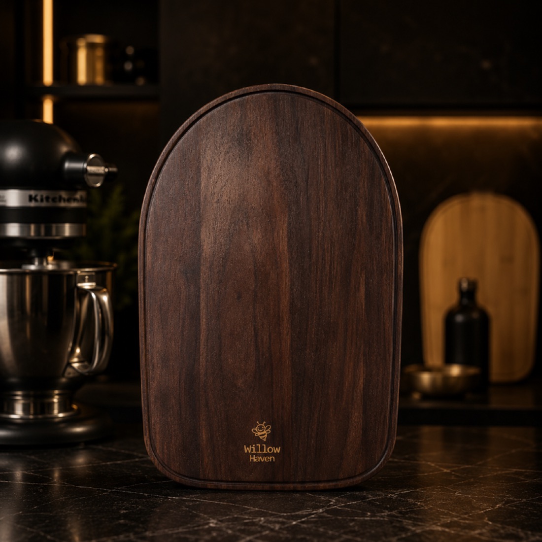 Dark acacia slider standing in a black kitchen beside a black stand mixer